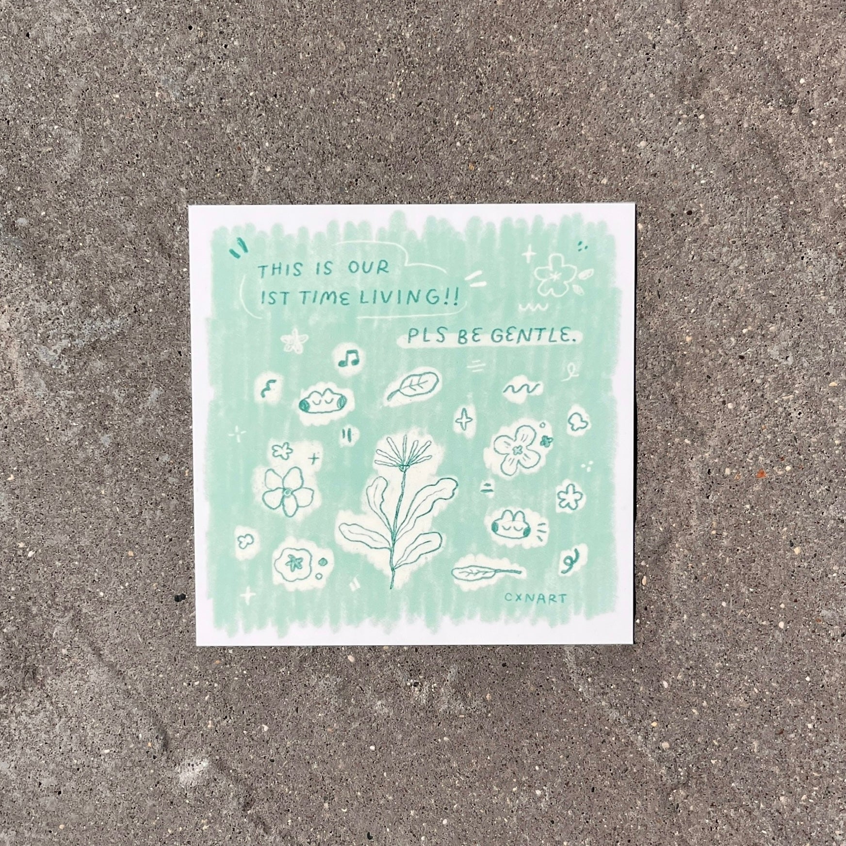 This image features a charming and artistic postcard sized art print titled "our first time living!!". The print, inspired by the theme of new beginnings and compassion, depicts a variety of delicate plants and flowers intertwined with gentle words of advice.